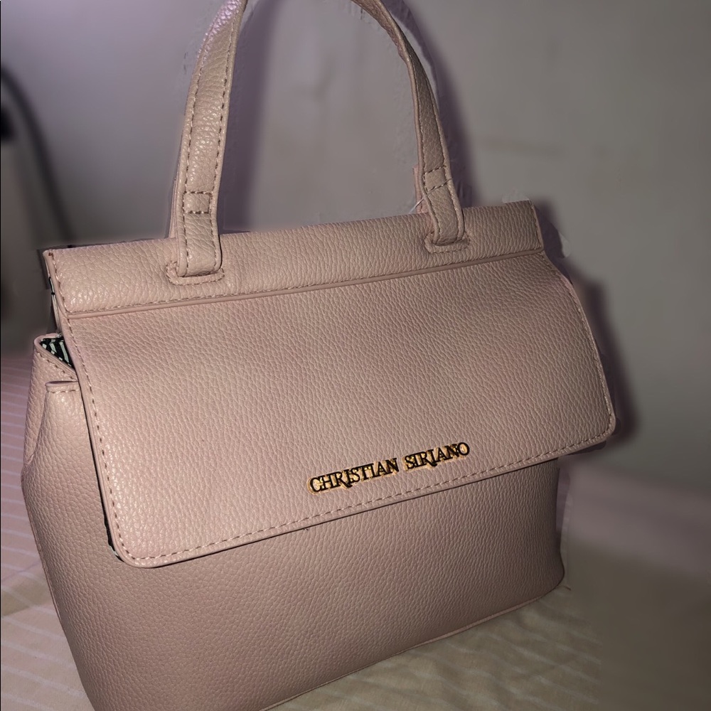 Christian Siriano pink crossbody handbag.